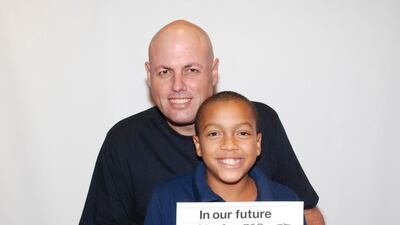Giorgio Ungania with his son, Sky Ungania, in this photo taken in 2010 at a TEDxDubai Change event, when the child was 11. Courtesy Ungania family