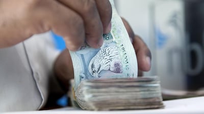 The business owner wants to understand whether to apply VAT to invoices for any new customers. Silvia Razgova / The National