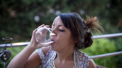 21:46 - Ms Mekhalfia takes her first sip of water after fasting all day at her friend’s home in Rillieux Caluire.