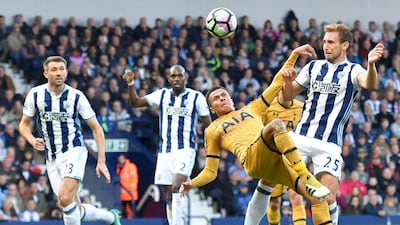 Tottenham Hotspur’s Dele Alli, left, and West Bromwich Albion’s Craig Dawson battle for the ball during the English Premier League match at The Hawthorns, West Bromwich, England, on Saturday October 15, 2016. Dave Howarth / PA