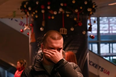 A relative of one of the victims on the crashed Ukraine International Airlines Flight PS752 reacts at the Boryspil airport outside Kiev on January 8, 2020. AFP