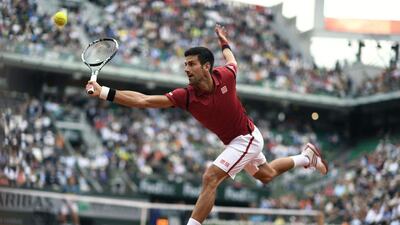 Serbia's Novak Djokovic returns the ball to Britain's Aljaz Bedene during their men's third round match at the Roland Garros 2016 French Tennis Open in Paris on May 28, 2016. AFP / MIGUEL MEDINA