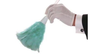 Mans Formal Gloved Hand and Arm With Duster isolated over white (iStockphoto.com)