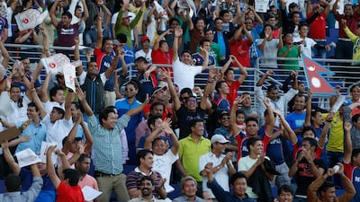Nepalese fans celebrate Nepal's win over the UAE during an ICC World Twenty 20 Qualifier in 2013. Antonie Robertson/The National