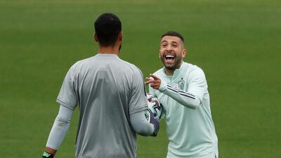 Spain's Jordi Alba with Robert Sanchez during training. Reuters