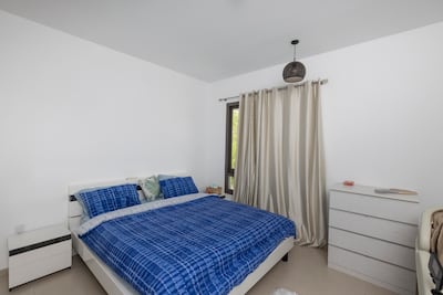 The master bedroom at the Town Square villa. Antonie Robertson / The National
