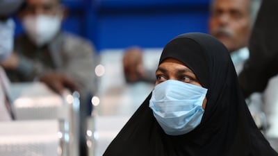 A woman wears a mask in Bangalore, India amid a wave of rising Covid-19 infections that are being blamed on the JN.1 coronavirus variant. EPA