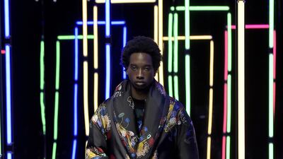 At Fendi, the drawings of Noel Fielding feel like embroidery on this puffed dressing gown coat for autumn / winter 2021. Courtesy Fendi