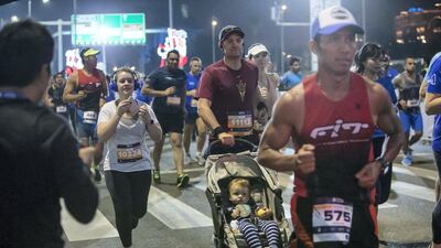 Participants at the Adnoc Abu Dhabi Marathon. Leslie Pableo for The National