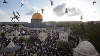 Palestinians attend Eid prayers and celebrations at Al Aqsa Mosque compound in Jerusalem. AP