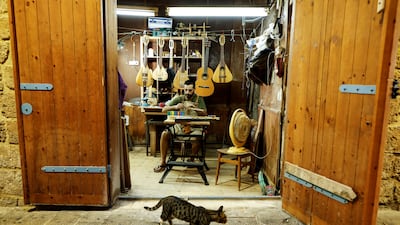 'The instrument is built on the chord La, unlike the guitar which is built on the chord Me,' Omari said. The name udulele is a combination of oud and ukulele.