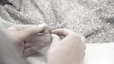 3. The embroidered pieces are then sent from the Montex ateliers to the Chanel ateliers so the seamstresses can begin assembling the dress. Courtesy Chanel