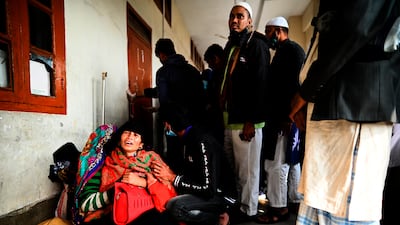 A relative of a ferry fire victim mourns at a government hospital in Barishal, Bangladesh. AP Photo