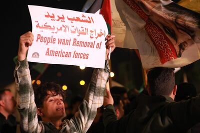 A supporter of pro-Iran factions in Tahrir Square, Baghdad, during a protest against the US and British forces strikes against Yemen's Houthi rebels, and against the presence of US forces in Iraq. AFP