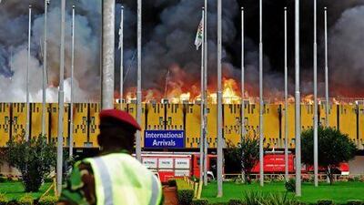 Flames and black smoke billow from the burning Jomo Kenyatta International Airport in Nairobi.