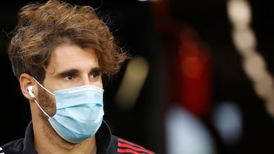 Bayern Munich's Spanish midfielder Javier Martinez wears a face mask as he arrives for the match. AFP