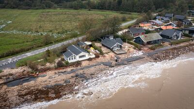 A road ruined after storm Babet hit Vilstrup and Diernaes in Southern Jutland, Denmark. EPA