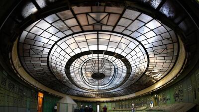 A picture taken with a wide angle lens showing visitors look at the former control room of Kelenfold Thermal Power Station during an open day event entitled the Night of the Power Plants in Budapest, Hungary. Most parts of the former power plant, which started operation in 1914, are now redundant and considered industrial monuments. EPA