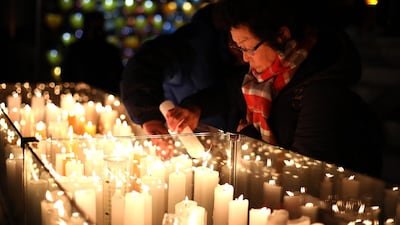Buddhists light candles during New Year celebrations at Jogyesa Buddhist temple on January 1, 2019 in Seoul, South Korea. Getty Images