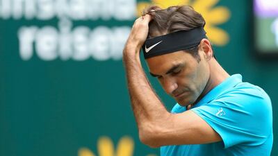 Roger Federer lost on grass for the first time in 12 months as he fell to defeat against Borna Coric at Halle. Friso Gentsch /dpa via AP