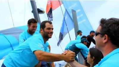 Crew of the Spanish boat Telefonica get a welcoming reception on arrival in Sanya, southern China's Hainan province today, with a handsome 90-minute victory to claim a hat-trick triumph in the leg from Abu Dhabi.
