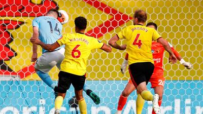 Manchester City's Aymeric Laporte scores his team's fourth goal against Watford at Vicarage Road Stadium on Tuesday. AFP