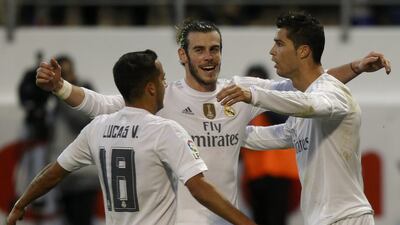 Real Madrid's Cristiano Ronaldo, right, celebrates scoring the second goal with teammates Gareth Bale, centre, and Lucas Vazquez. REUTERS/Joseba Etxaburu