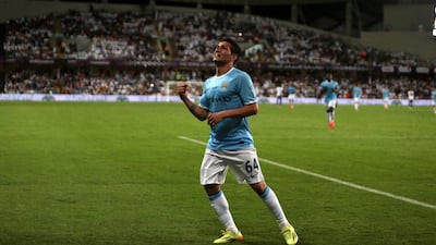 Manchester City's Marcos Lopes celebrates his goal against Al Ain to make it 1-0 in their 3-0 victory in the exhibition friendly at the Hazza bin Zayed Stadium in Al Ain in May. Christopher Pike / The National / May 15, 2014