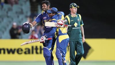 Sri Lanka's Lahiru Thirimanne celebrates with Kushal Janith Perera.