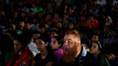 Supporters could not take their eyes off the action on the pitch. Reuters