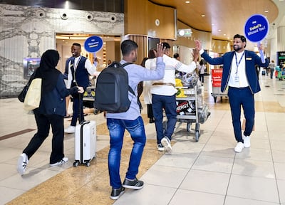 DXB staff welcome back UAE residents. Photo: Dubai Airports