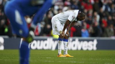 Rodolph Austin, right, and Marco Silvestri of Leeds United react during their FA Cup third round loss to Sunderland on Sunday. Andrew Yates / Reuters