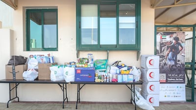 Some of the goods donated by pupils and their families at American Community School of Abu Dhabi. Victor Besa / The National