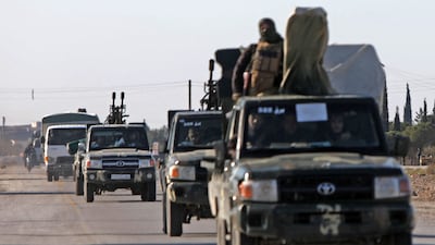 Syrian government reinforcements travel to the SDF-held Dayr Hafir-Maskanah area, east of Aleppo. AFP