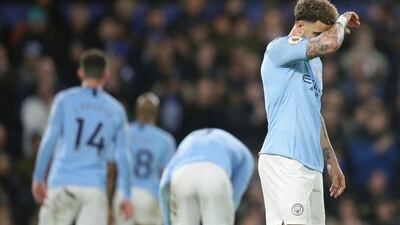 Manchester City's Kyle Walker, right, after the defeat to Chelsea. AP Photo
