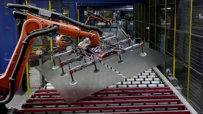 Robots on the production line at a low-iron, textured solar glass manufacturer in Ankleshwar, India. Crescent aims to capitalise on opportunities in markets with rising digital adoption. Reuters