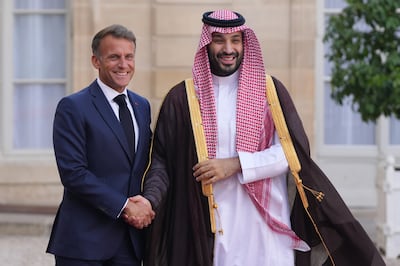 Saudi Crown Prince Mohammed bin Salman is greeted by Emmanuel Macron, France's President, at the Elysee Palace in Paris on August 24. Bloomberg