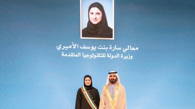 Sheikh Mohammed with Sarah Al Amiri, Minister of State for Advanced Technology. Photo: @HHShkMohd / Twitter