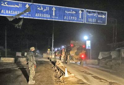 Turkish military vehicles head towards the Syrian southern countryside of the rebel-held Idlib province through the Bab Al Hawa border crossing with Turkey. AFP