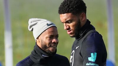 England's Raheem Sterling, left, and Joe Gomez during training. Reuters