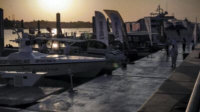 People arrive on the first day of the boat show.
