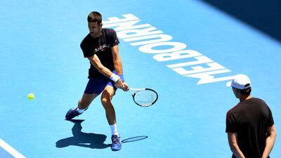 Novak Djokovic of Serbia is watched by coach Goran Ivanisevic. AFP