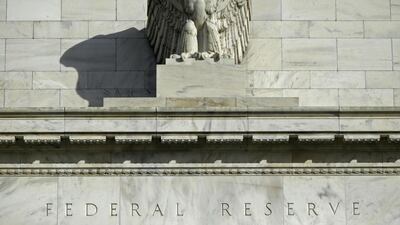 The fortunes of bonds depend on the direction of interest rates, and the most useful indicators, future traders, see a 98 per cent probability of a rate hike by the US Federal Reserve, above, next month. Gary Cameron / Reuters