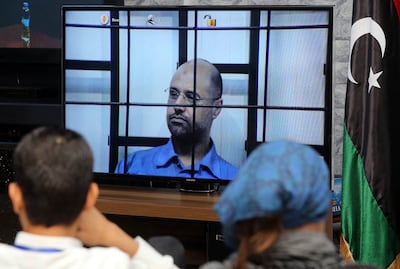 Saif Al Islam questioned in court in 2014. His candidacy for an aborted election in 2021 revealed his continuing political ambitions. AFP