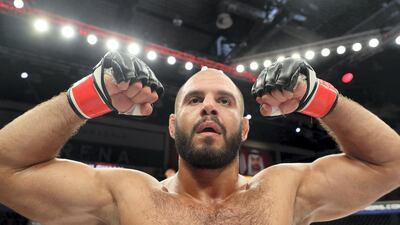 Tarek Suleiman celebrates his victory over Steve Kennedy in the middleweight division during the UAE Warriors event at the Mubadala Arena. Chris Whiteoak / The National