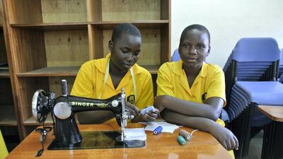 Pupils from St Katherine Secondary School demonstrate their sewing station as part of an exhibition for Dubai Cares. Roberta Pennington / The National