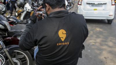 A food delivery rider for Swiggy in Mumbai. India's food-tech industry is poised to grow between 25 per cent and 30 per cent a year to reach $8bn by 2023. Bloomberg