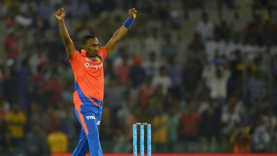Dwayne Bravo took four wickets to help the Gujarat Lions to victory against Kings XI Punjab. Sajjad Hussain / AFP