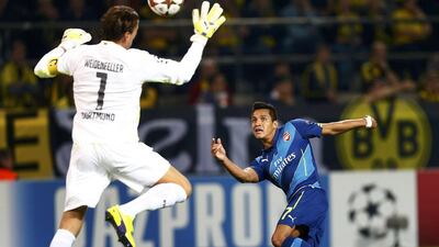 Borussia Dortmund's goalkeeper Roman Weidenfeller saves a shot from Arsenal's Alexis Sanchez during their Uefa Champions League match on Tuesday night. Dortmund won 2-0. Ralph Orlowski / Reuters