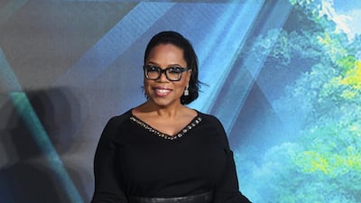 Oprah Winfrey wears a black top, statement belt and floor-sweeping Brunello Cucinelli skirt to attend the European premiere of 'A Wrinkle in Time' in London, England on March 13, 2018. EPA